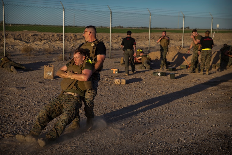 U.S. Marines stationed at Marine Corps Air Station (MCAS) Yuma conduct a Casualty Evacuation run as part of their physical training during Corporals Course at MCAS Yuma, Ariz., May 15, 2019. Corporals Course is a leadership class designed to teach Marines the fundamentals of being a noncomissioned officer. (U.S. Marine Corps photo by Pfc. John Hall)