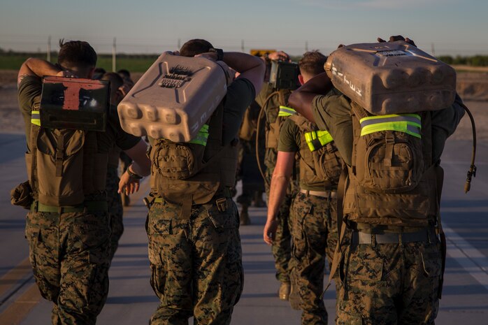 U.S. Marines stationed at Marine Corps Air Station (MCAS) Yuma conduct a Casualty Evacuation run as part of their physical training during Corporals Course at MCAS Yuma, Ariz., May 15, 2019. Corporals Course is a leadership class designed to teach Marines the fundamentals of being a noncomissioned officer. (U.S. Marine Corps photo by Pfc. John Hall)