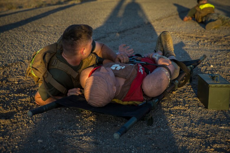 U.S. Marines stationed at Marine Corps Air Station (MCAS) Yuma conduct a Casualty Evacuation run as part of their physical training during Corporals Course at MCAS Yuma, Ariz., May 15, 2019. Corporals Course is a leadership class designed to teach Marines the fundamentals of being a noncomissioned officer. (U.S. Marine Corps photo by Pfc. John Hall)