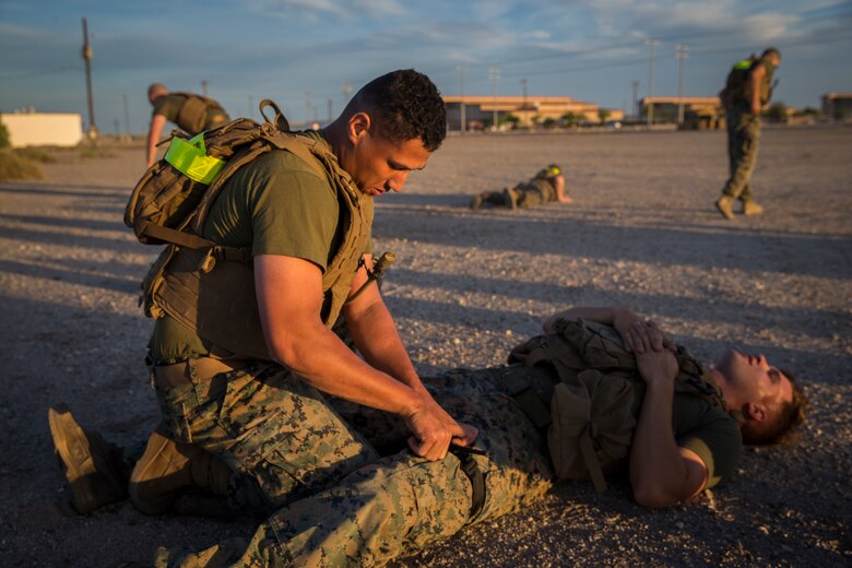 U.S. Marines stationed at Marine Corps Air Station (MCAS) Yuma conduct a Casualty Evacuation run as part of their physical training during Corporals Course at MCAS Yuma, Ariz., May 15, 2019. Corporals Course is a leadership class designed to teach Marines the fundamentals of being a noncomissioned officer. (U.S. Marine Corps photo by Pfc. John Hall)
