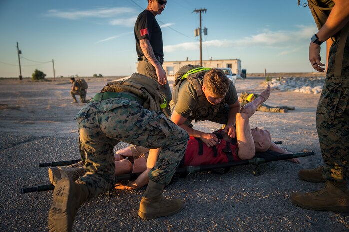 U.S. Marines stationed at Marine Corps Air Station (MCAS) Yuma conduct a Casualty Evacuation run as part of their physical training during Corporals Course at MCAS Yuma, Ariz., May 15, 2019. Corporals Course is a leadership class designed to teach Marines the fundamentals of being a noncomissioned officer. (U.S. Marine Corps photo by Pfc. John Hall)