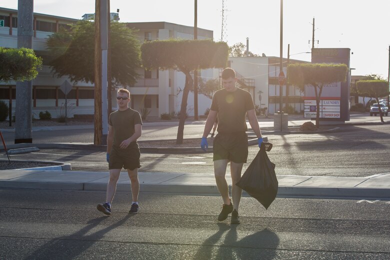 U.S. Marines with Headquarters & Headquarters Squadron (H&HS) conduct a base wide clean up at Marine Corps Air Station (MCAS) Yuma, Ariz., May 15, 2019. The base clean up is intended to boost unit morale and ensure the cleanliness of MCAS Yuma. (U.S. Marine Corps photo by Cpl. Sabrina Candiaflores)