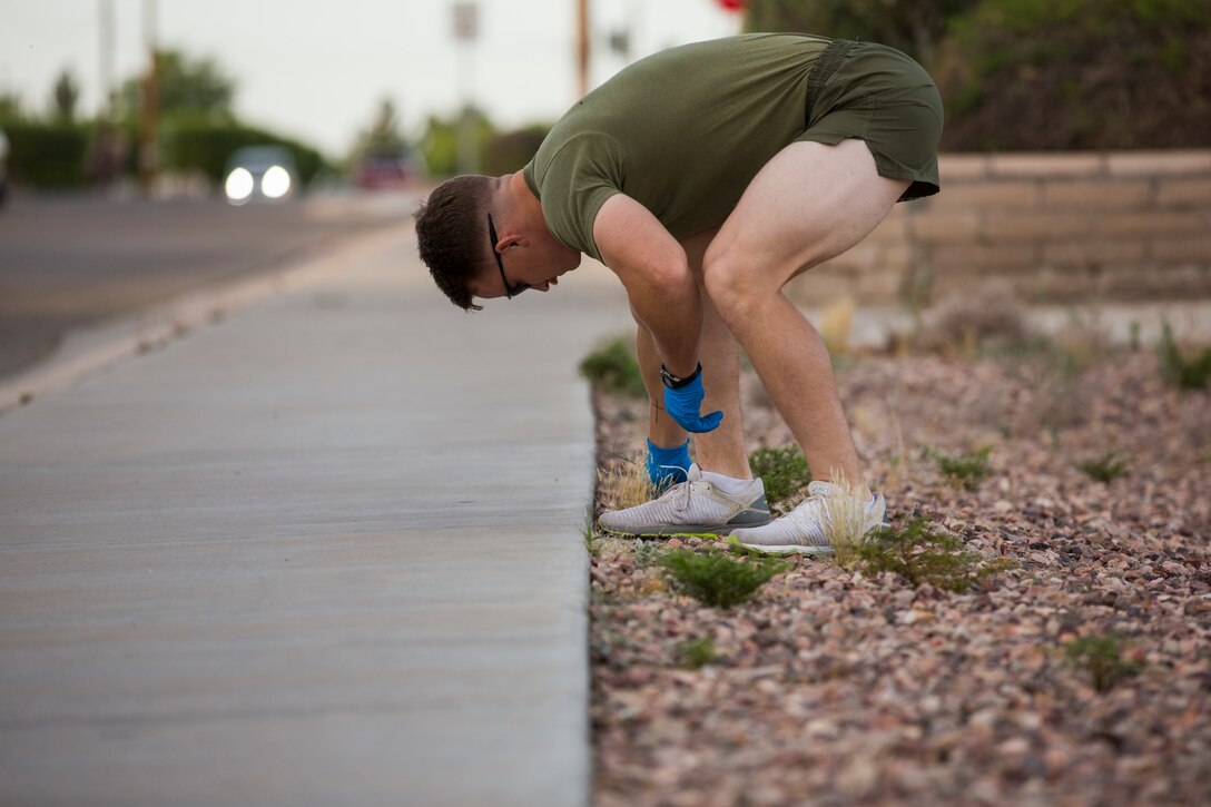 U.S. Marines with Headquarters & Headquarters Squadron (H&HS) conduct a base wide clean up at Marine Corps Air Station (MCAS) Yuma, Ariz., May 15, 2019. The base clean up is intended to boost unit morale and ensure the cleanliness of MCAS Yuma. (U.S. Marine Corps photo by Cpl. Sabrina Candiaflores)