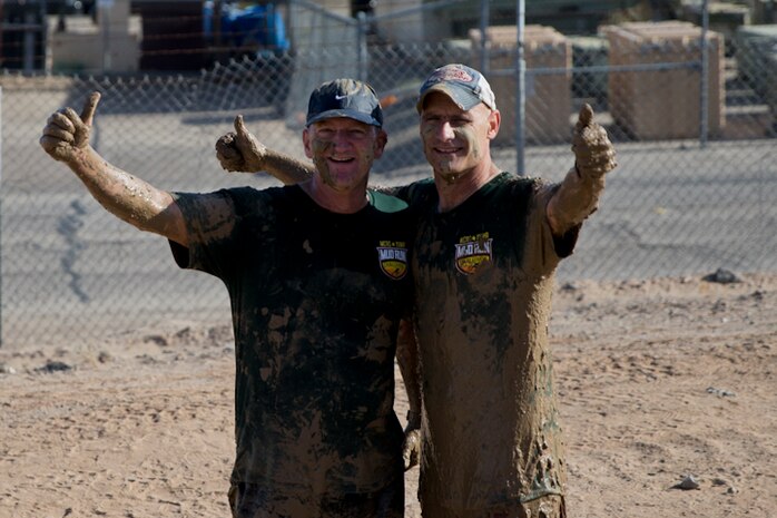 U.S. Marines, Sailors, and Civilians participate in the Marine Corps Air Station (MCAS) Yuma Mud Run at MCAS Yuma Ariz., May 18, 2019. The Mud Run consisted of various obstacles for all of the participants in both the competitive and non-competitive events. (U.S. Marine Corps photo by Lance Cpl. Joel Soriano)