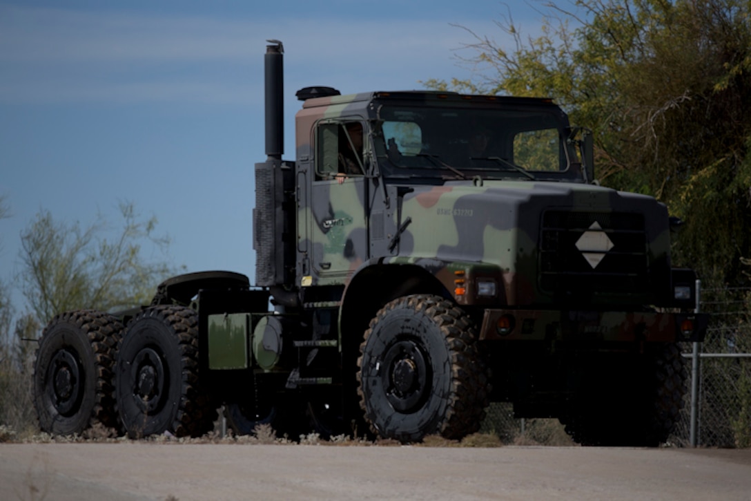 U.S. Marines with Marine Wing Support Squadron (MWSS) 371 participate in a Mud and Fording Course at Cibola Lake Mud course and Fording Basin, Yuma Proving Grounds Ariz., May 21, 2019. The mission of the MWSS-371 Mud and Fording Course is to enhance motor vehicle proficiency while in a wet and humid environment. (U.S. Marine Corps photo by Lance Cpl. Joel Soriano)