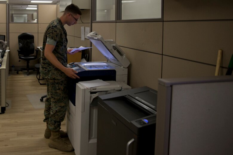 U.S. Marine Corps Lance Cpl. Matthew E. Rivera, an administrative specialist with Installation Personnel Admin Center (IPAC), Headquarters and Headquarters Squadron Marine Corps Air Station (MCAS) Yuma, conducts his administrative duties at the IPAC on MCAS Yuma Ariz., May 28, 2019. The IPACs' mission is to provide professional, quality personnel administration services to all Marines and family members assigned to MCAS Yuma. Ensuring every Marine is administratively ready for worldwide assignment. (U.S. Marine Corps photo by Lance Cpl. Joel Soriano)