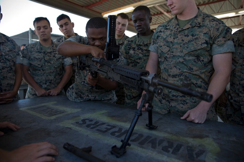 U.S. Marines with Marine Air Control Squadron (MACS) 1 conduct Crew-Served Weapons Handling Training at Marine Corps Air Station Yuma Ariz., May 29, 2019. The purpose of this training is to ensure that Marines are familiar with the handling and operations of the M240B machine gun. (U.S. Marine Corps photo by Lance Cpl Joel Soriano)
