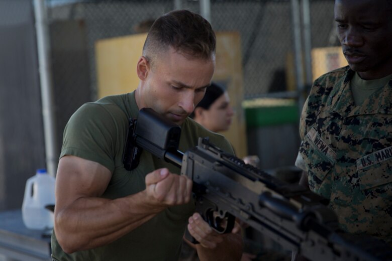 U.S. Marines with Marine Air Control Squadron (MACS) 1 conduct Crew-Served Weapons Handling Training at Marine Corps Air Station Yuma Ariz., May 29, 2019. The purpose of this training is to ensure that Marines are familiar with the handling and operations of the M240B machine gun. (U.S. Marine Corps photo by Lance Cpl Joel Soriano)