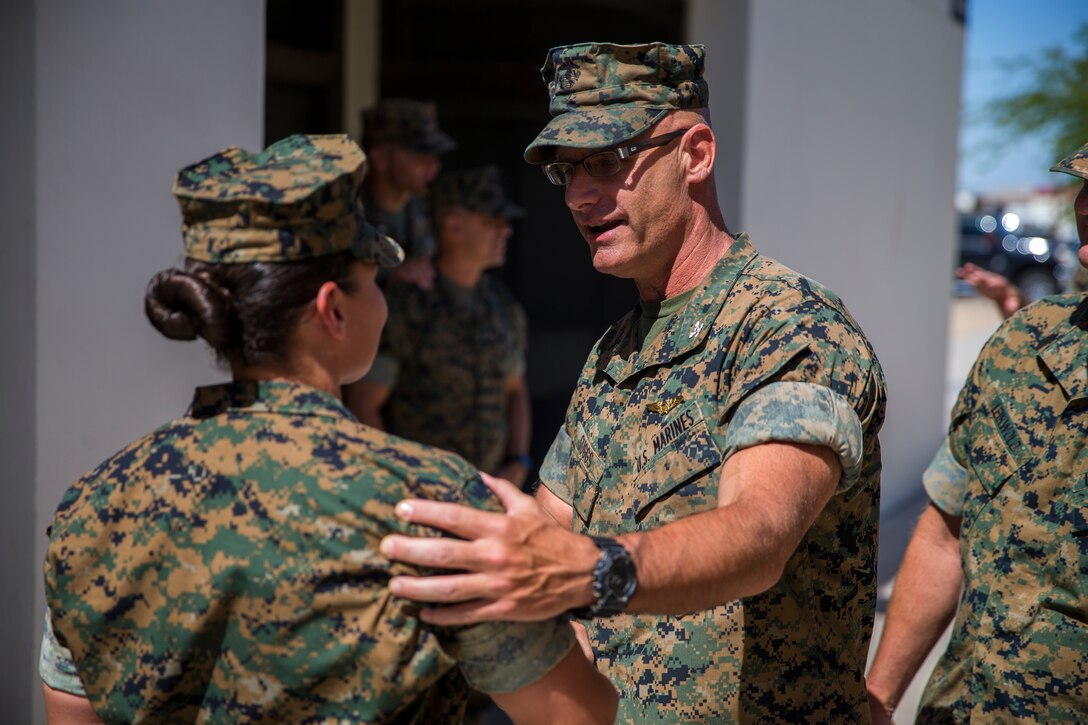 U.S. Marine Corps 1stSgt. Melisa Y. Cancienne, the Marine Corps Air Station (MCAS) Yuma Headquarters and Headquarters Squadron 1stSgt., is pinned during her frocking ceremony at MCAS Yuma, Ariz., June 3, 2019. Traditionally, a 1stSgt. serves as the senior enlisted advisor to the commander of a company, but in H&HS's case the 1stSgt Cancienne will be the senior enlisted advisor to the commander of the squadron. (U.S. Marine Corps photo by Lance Cpl. John Hall)
