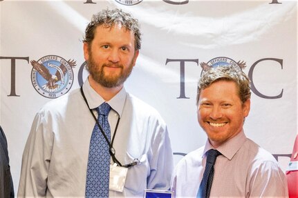 WASHINGTON, D.C. (June 11, 2019) Naval Surface Warfare Center, Philadelphia Division (NSWCPD) Dave Perritt (left) and Ryan Fox (right) won the 2019 Training Officers Consortium’s Learning Technologies Award during the 64th annual Distinguished Service Awards Ceremony. Perritt and Fox created the Command’s Course Catalog and Registration Tool that helps manage, track, and register employees for NSWCPD’s on-site workforce development classes. (U.S. Navy photo provided by Training Officers Consortium)/Released