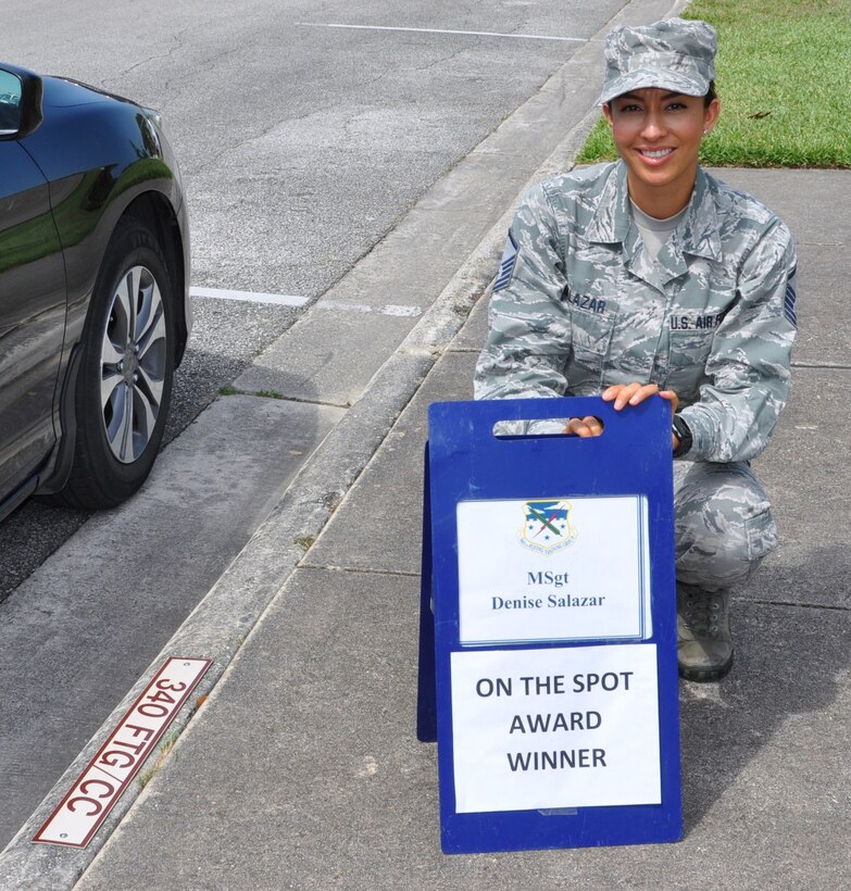 Master Sgt. Denise Salazar, 340th Flying Training Group Military Personnel Section, Customer Support NCOIC, claims her turn in the boss' parking slot following her  selection as the 340 FTG May On-the-Spot Award winner. (U.S. Air Force photo by janis El Shabazz)