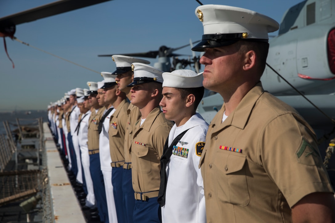 Marines and Sailors man the rails as the San Antonio-class amphibious transport dock ship USS New York transits the Hudson River in preparation for Fleet Week New York, May 22, 2019. Fleet Week NY is an opportunity for the American public to meet their Marine Corps, Navy, and Coast Guard service members and experience America’s sea services firsthand.