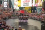 Marines with the U.S. Marine Corps Silent Drill Platoon execute their “bursting bomb” sequence during their performance as a part of a Battle Color Ceremony for New York Fleet Week at Times Square, Manhattan, NY, May 27, 2018. Fleet Week New York is an opportunity for the American public to meet their Marine Corps, Navy and Coast Guard teams and experience America’s sea services.