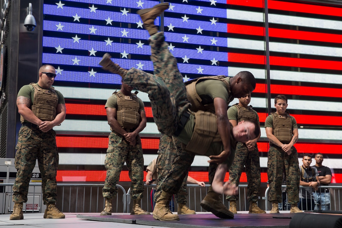 U.S. Marines perform hand-to-hand combat techniques during a Marine Corps Martial Arts Program demonstration in Times Square, New York, NY, May 24, 2019. MCMAP is a fundamental skill for all Marines that strengthens combat readiness and promotes physical and mental fitness. Fleet Week NY is an opportunity for the American public to meet their Marine Corps, Navy, and Coast Guard service members and experience America’s sea services firsthand.