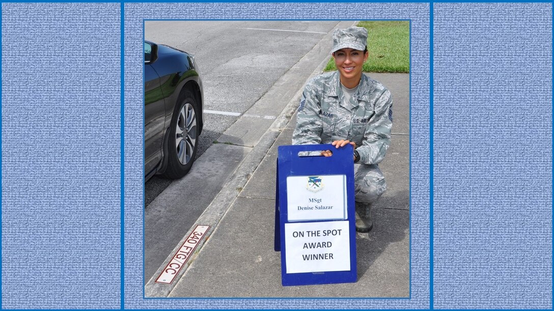 Master Sgt. Denise Salazar, 340th Flying Training Group Military Personnel Section, Career Development NCOIC, claims her turn in the boss' parking slot following her  selection as the 340 FTG May On-the-Spot Award winner. (U.S. Air Force photo by Janis El Shabazz)