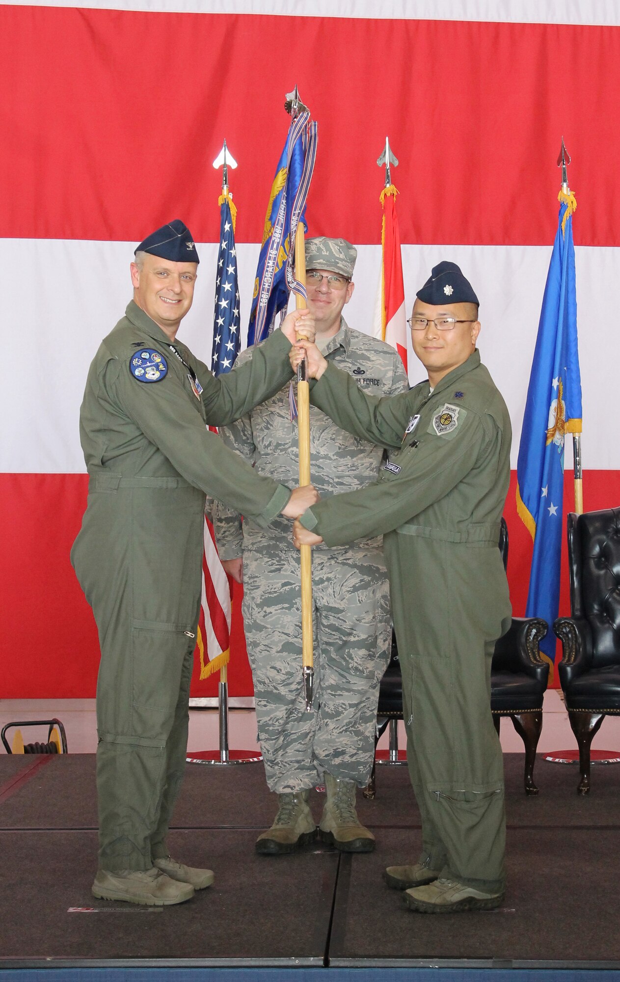Lt. Col. Jerrad Brown assumed command of the 960th Airborne Air Control Squadron during a formal ceremony at the 552nd Air Control Wing June 18. Col. Joshua Conine, 552nd Operations Group commander, presided over the ceremony as Lt. Col. James Ord relinquished command.  (U.S. Air Force photo/2nd Lt. Ashlyn K. Paulson)