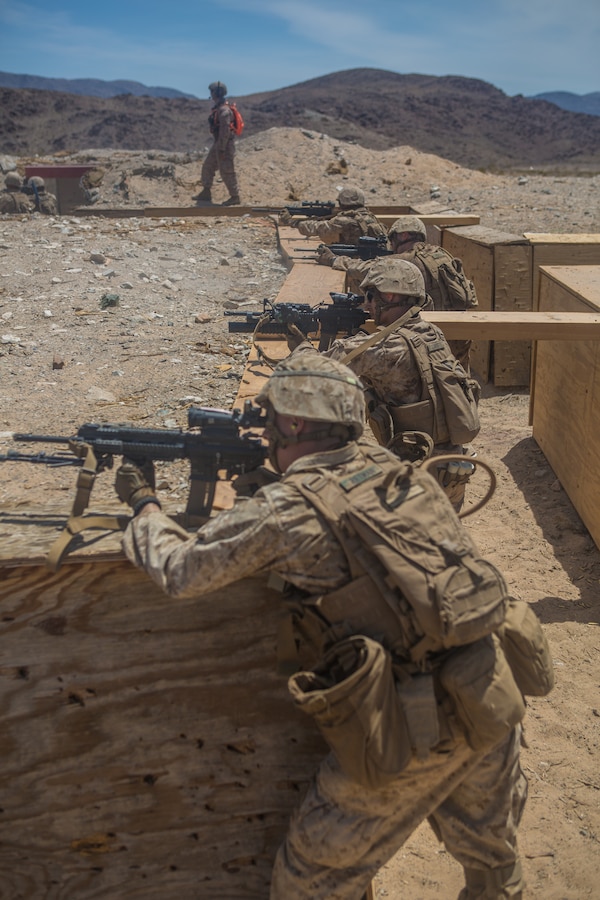 Riflemen with C Company, 1st Battalion, 24th Marine Regiment, 4th Marine Division, provide suppressive fire on Range 410A during Integrated Training Exercise 4-19 at Marine Corps Air Ground Combat Center, Twentynine Palms, Calif., June 17, 2019. Marine Forces Reserve units participate in ITX to both complete annual training requirements and to increase unit readiness and proficiency. (U.S. Marine Corps photo by Lance Cpl. Preston L. Morris)