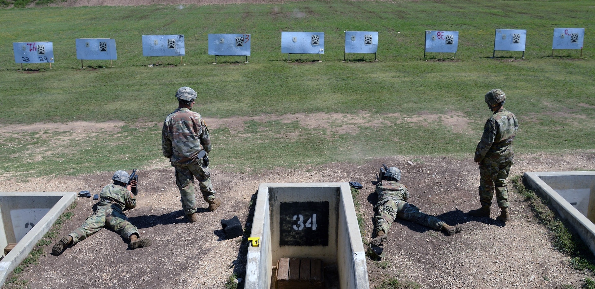 Soldiers participate in an M-16 qualification during the Brooke Army Medical Center Best Medic Competition at Joint Base San Antonio-Camp Bullis June 13. The competitors were tested on both warrior and medic skills during the competition.