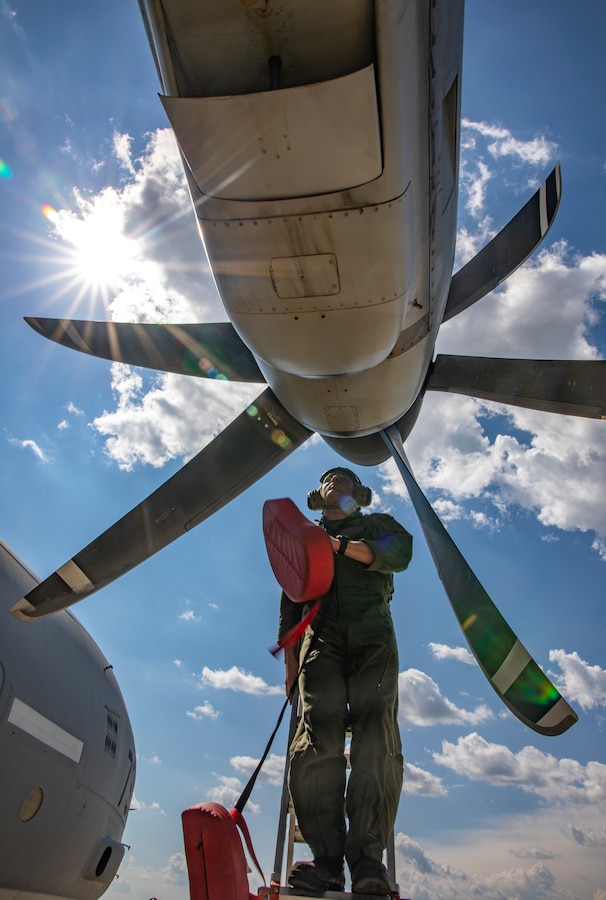 U.S. Marine Corps Lance Cpl. Ty Stone, a crewmaster with Marine Aerial Refueler Transport Squadron 234, Marine Aircraft Group 41, 4th Marine Aircraft Wing, secures a KC-130 Hercules propeller after an aerial refueling training mission at Canadian Forces Base Cold Lake, Canada, June 17, 2019, in support of Sentinel Edge 19. MARFORRES squadrons participate in SE19 to both complete annual training requirements and to increase unit readiness and proficiency. (U.S. Marine Corps photo by Sgt. Andy O. Martinez)