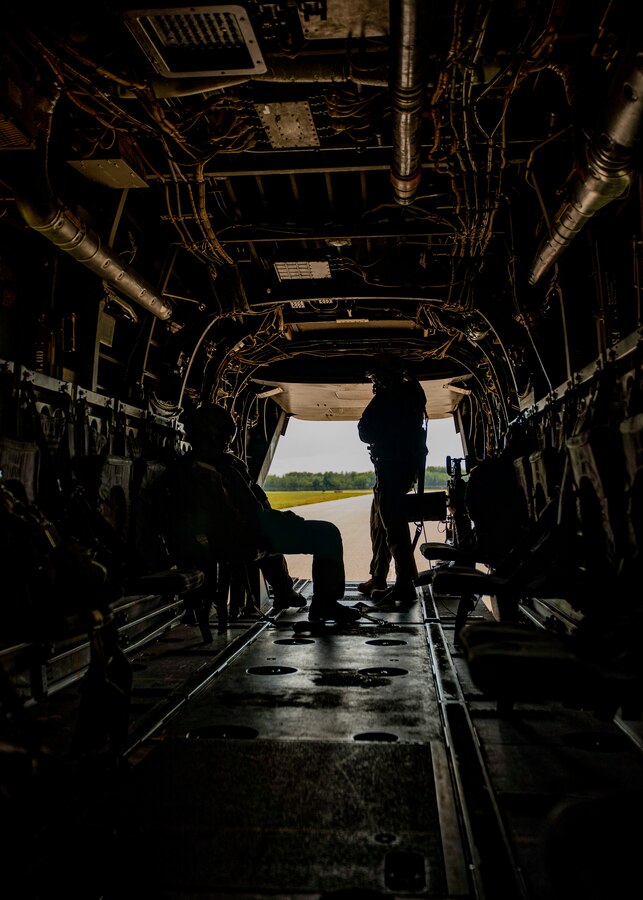 U.S. Marines with Marine Medium Tiltrotor Squadron 764, Marine Aircraft Group 41, 4th Marine Aircraft Wing, observe the flightline after an aerial refueling training mission at Canadian Forces Base Cold Lake, Canada, June 17, 2019, in support of Sentinel Edge 19. Exercises like SE19 ensure MARFORRES is a proficient force, ready for world-wide deployment at any given time. (U.S. Marine Corps photo by Lance Cpl. Jose Gonzalez)