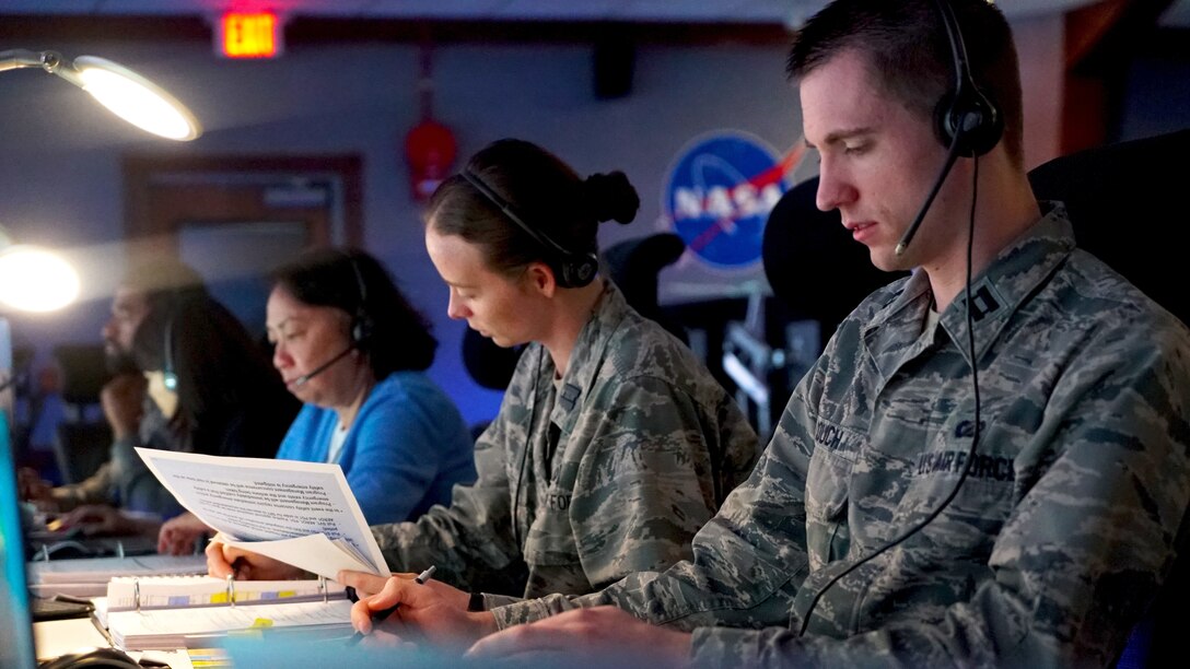 Members of Space and Missile Systems Center, and The Aerospace Corporation, focuses on solving a launch anomaly given to the team, during the second Integrated Crew Exercise (ICE-2), on May 23, 2019, at Cape Canaveral, Florida. [USAF Photo by: Walter Talens, SMC/PA]