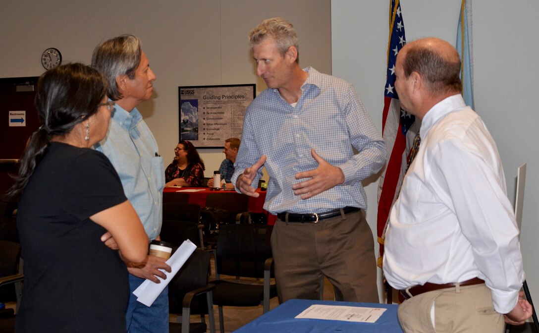 ALBUQUERQUE, N.M. – Bernadette Tsosie and William Frazier, (left), both site managers with the Dept. of Energy’s Office of Legacy Management, and Ragan Glandon, (far right), chief of the Albuquerque District’s Technical Support Branch, listen to Bruno Quirici, chief of the district’s Environmental Engineering Section, during a workshop for Military and Interagency and International Services stakeholders, June 12, 2019.