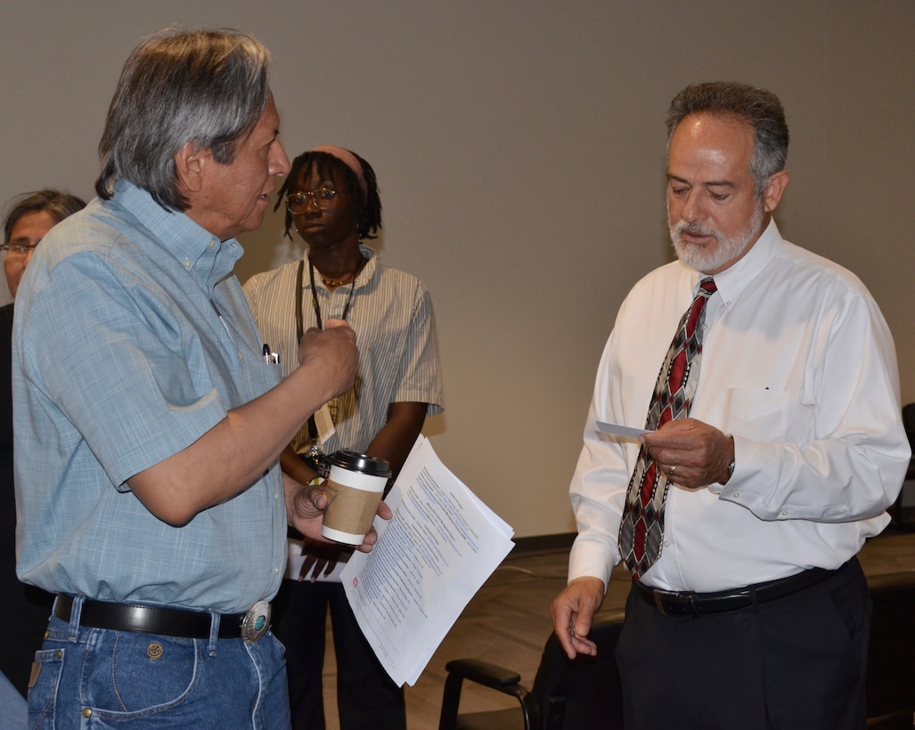 ALBUQUERQUE, N.M. -- William Frazier, (left), site manager with the Dept. of Energy’s Office of Legacy Management, speaks with Phillip Roybal, architect in the Albuquerque District’s Construction Branch, during a workshop for Military and Interagency and International Services stakeholders, June 12, 2019. The workshop was designed to give stakeholders a better understanding of what services the Albuquerque District provides, and how the district operates and conducts business.