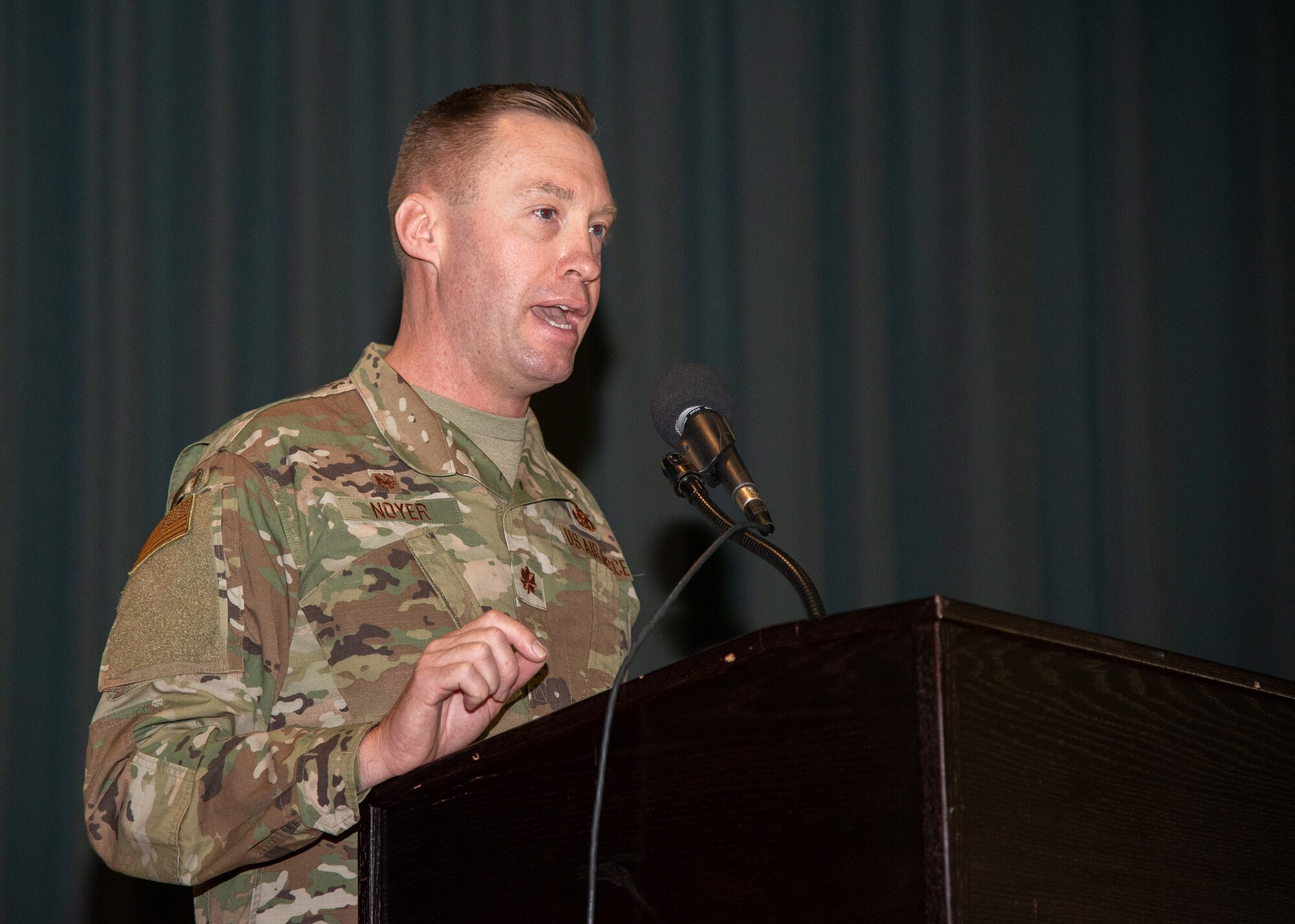 Maj. Daniel Noyer, newly appointed 349th Maintenance Squadron commander, addresses Reserve Citizen Airmen following an assumption of command ceremony June 2, 2019.