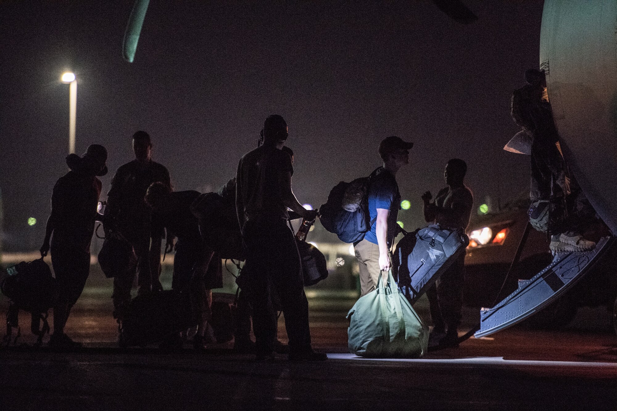 U.S. Air Force Airmen assigned to the 75th Expeditionary Airlift Squadron board a C-130J Super Hercules at Camp Lemonnier, Djibouti, June 5, 2019. The 75th EAS provides support in medical evacuations, disaster relief, humanitarian and airdrop operations. (U.S. Air Force photo by Staff Sgt. Devin Boyer)