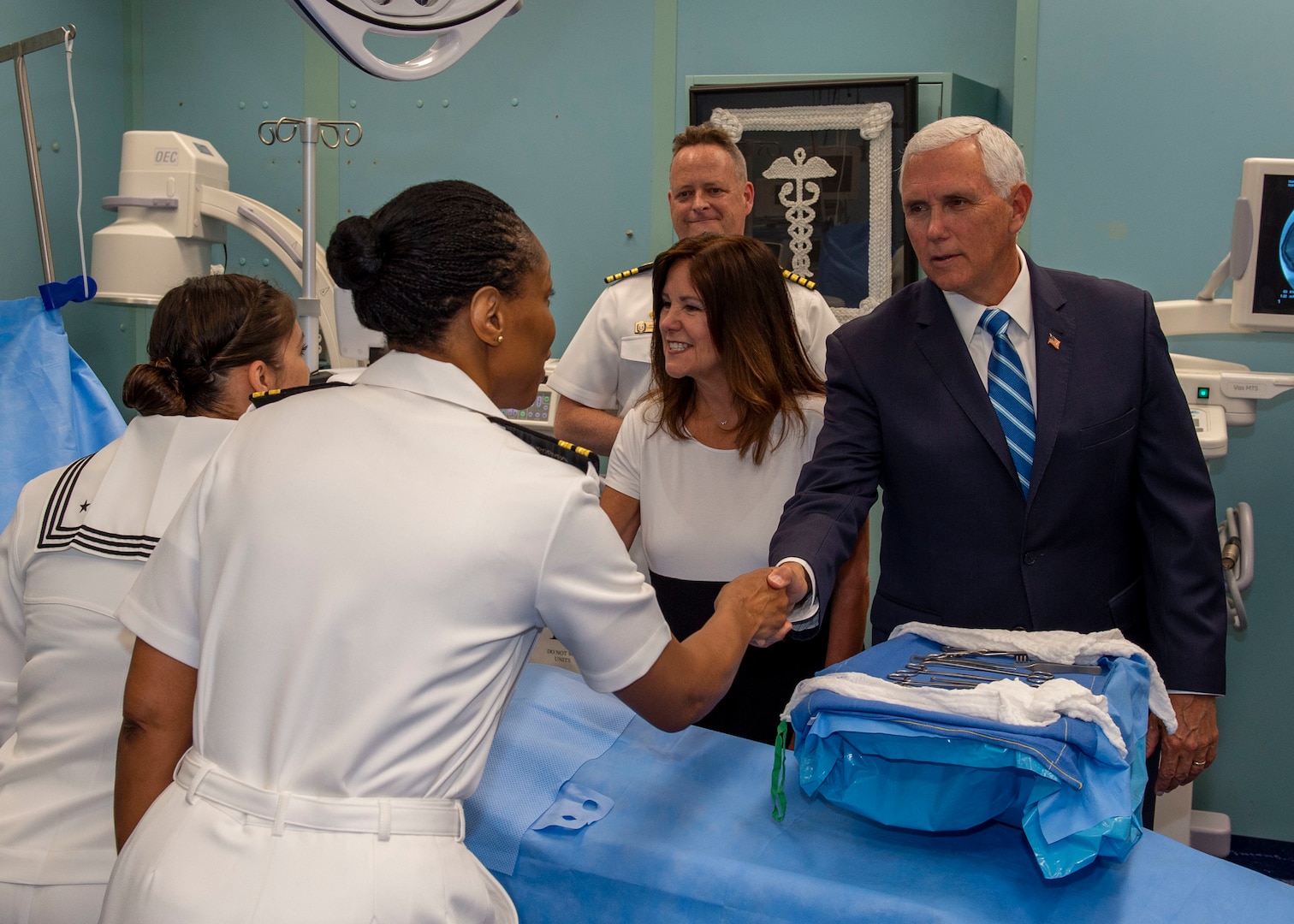 Vice President Mike Pence greets Lt. Gwendolyn Mann, from Hampton, Va. and second lady Karen Pence greets Hospital Corpsman 1st Class Edna Wallace from El Paso, Texas during a tour aboard hospital ship USNS Comfort (T-AH 20).