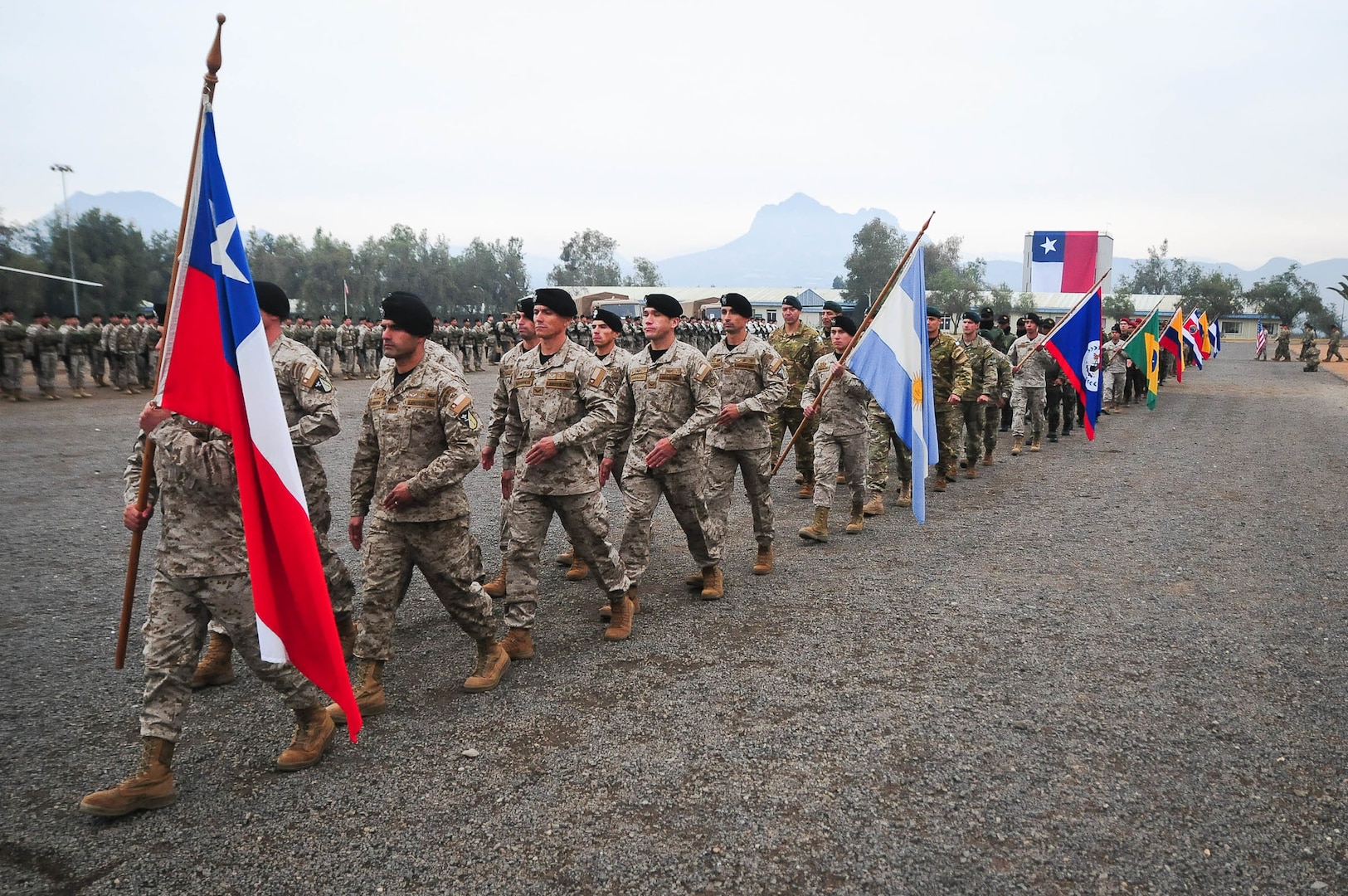 Special-forces soldiers from 19-different countries march across the parade field during the opening ceremony of Fuerzas Comando 2019.