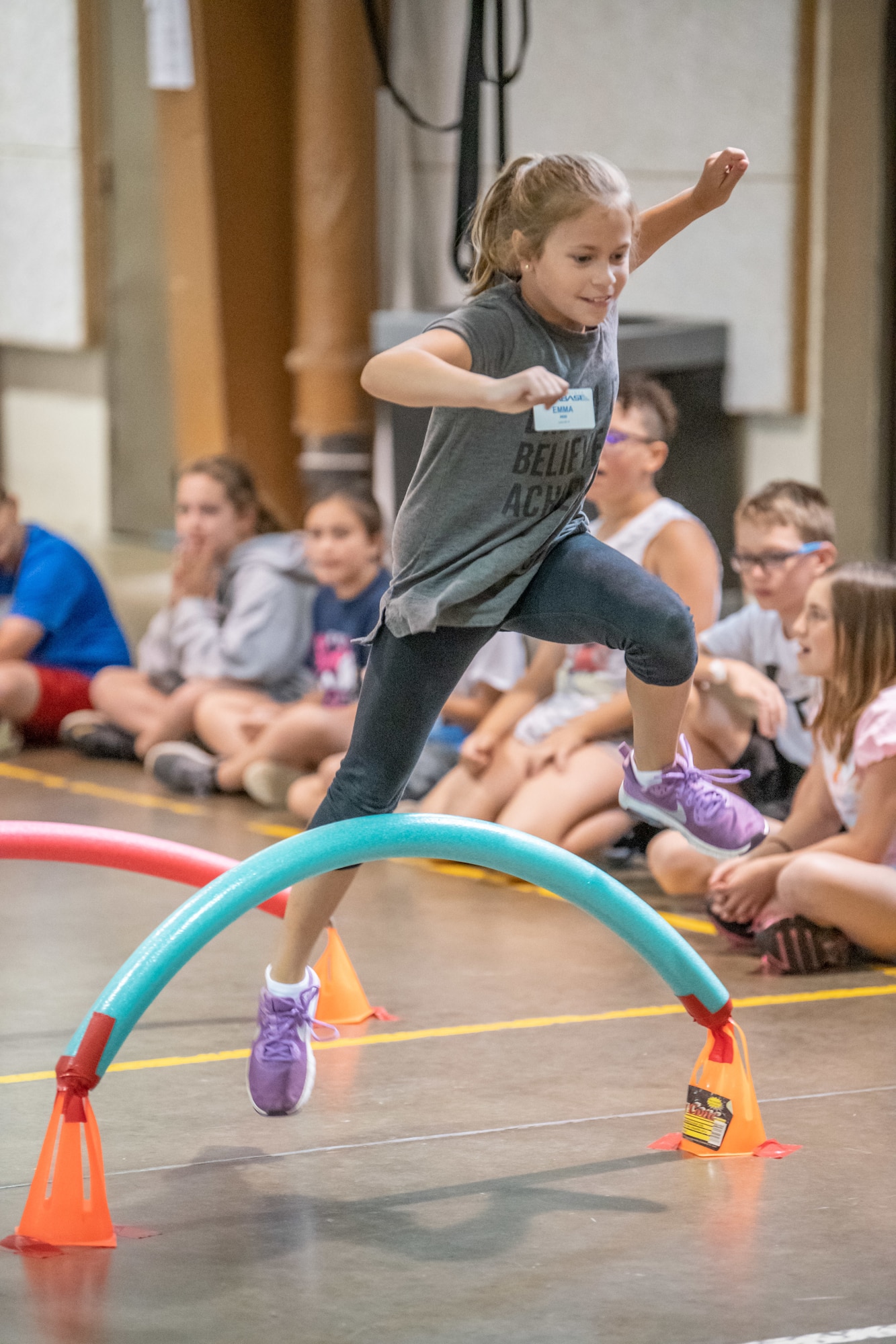A camper participates in an agility obstacle course during the Starbase summer camp June 10, 2019, in Charleston, W.Va.  The Starbase camp was held June 10-14, 2019, and is designed for children of military members giving them opportunities to bond with children from other military families. (U.S. Army National Guard photo by Edwin L Wriston)