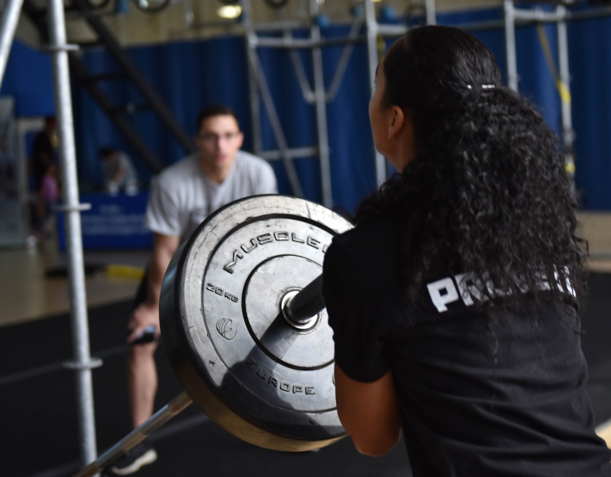 U.S. Air Force 1st Lt. Nicole Mitchell, 83rd Network Operations Squadron assistant and director of operations, completes an obstacle at Joint Base Langley-Eustis, Virginia, June 15, 2019.
