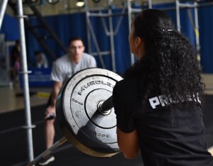 U.S. Air Force 1st Lt. Nicole Mitchell, 83rd Network Operations Squadron assistant and director of operations, completes an obstacle at Joint Base Langley-Eustis, Virginia, June 15, 2019.