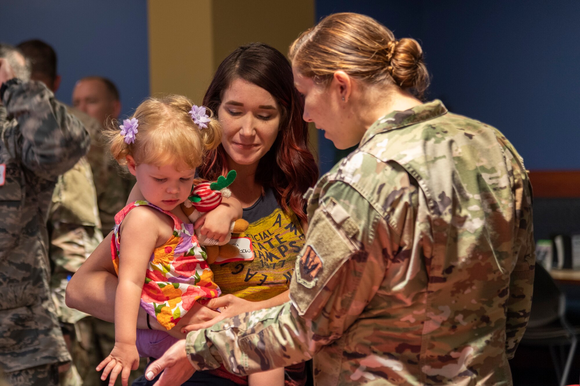 Participants socialize during a deployed spouse dinner, June 18, 2019, at Moody Air Force Base, Ga. The dinner served as an opportunity for the families of deployed members to bond and provide relief. The mission's success depends on resilient Airmen and families, who are prepared to make sacrifices with the support of their fellow Airmen, local communities and leadership. (U.S. Air Force photo by Airman 1st Class Hayden Legg)