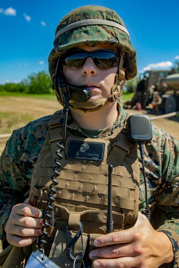 U.S. Marine Corps Sgt. Angelo Tuccitto, a bulk fuel specialist with Marine Wing Support Squadron 471, Marine Aircraft Group 41, 4th Marine Aircraft Wing, poses for a photo during a Forward Arming and Refueling Point operation at Cold Lake Air Weapons Range, Alberta, Canada, June 18, 2019, in support of Sentinel Edge 19. MARFORRES squadrons participate in SE19 to both complete annual training requirements and to increase unit readiness and proficiency. (U.S. Marine Corps photo by Lance Cpl. Jose Gonzalez)