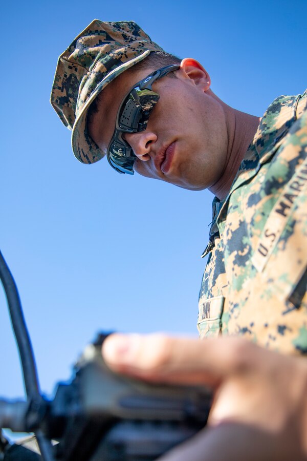 U.S. Marine Corps Lance Cpl. Evan Zink, a radio operator with Marine Wing Support Squadron 471, Marine Aircraft Group 41, 4th Marine Aircraft Wing, observes a radio system during a Forward Arming Refueling Point operation at Cold Lake Air Weapons Range, Alberta, Canada, June 18, 2019, in support of Sentinel Edge 19. Exercises like SE19 ensure MARFORRES is a proficient force, ready for world-wide deployment at any given time. (U.S. Marine Corps photo by Sgt. Andy O. Martinez)