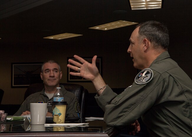 Col. Joseph Campo,49th Wing commander, listens to Brig. Gen. Christopher Short, Aircrew Crisis Task Force director, speak on the Air Force pilot shortage, June 18, 2019, on Holloman Air Force Base, N.M. Short explains that the company grade officer shortage of more than 1,800 pilots in 2018 was simply because they were not produced. Short is looking for ways to improve the retention and production rates of pilots. (U.S. Air Force photo by Airman 1st Class Autumn Vogt)