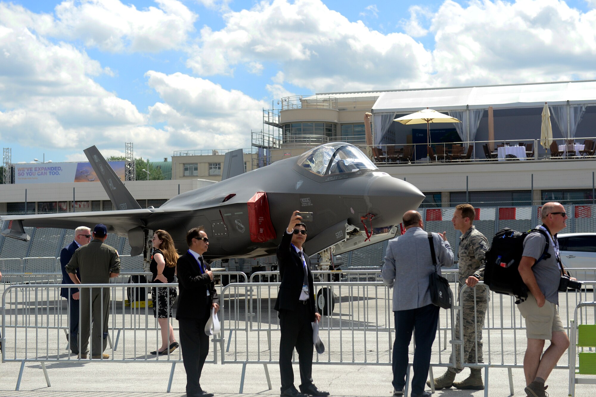 A Paris Air Show visitor takes a selfie with an F-35A Lightning II from Hill Air Force Base, Utah, June 17, 2019.