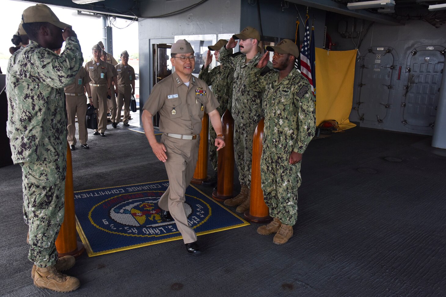 APRA HARBOR, Guam (June 8, 2019) Rear Adm. Jung II Shik, commander of the Republic of Korea Navy Submarine Force, comes aboard the submarine tender USS Emory S. Land (AS 39) for a scheduled tour, June 18.  Rear Adm. Jung is in Guam attending the 49th annual Submarine Warfare Committee meeting. During the meeting, U.S. and Korean officials discuss interoperability, the planning of combined training opportunities, and continued development of integrated anti-submarine warfare plans.