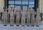 SANTA RITA, Guam (June 18, 2019) Rear Adm. Jimmy Pitts, Commander, Submarine Group Seven and Rear Adm. Jung II Shik, Commander, Republic of Korea Submarine Force pose for a photo with members of the 49th annual Submarine Warfare Committe Meeting outside of Konetzni Hall located at Polaris Point, Naval Base Guam. During the meeting, U.S. and Korean officials discussed interoperability, the planning of combined training opportunities, and continued development of integrated anti-submarine warfare plans.