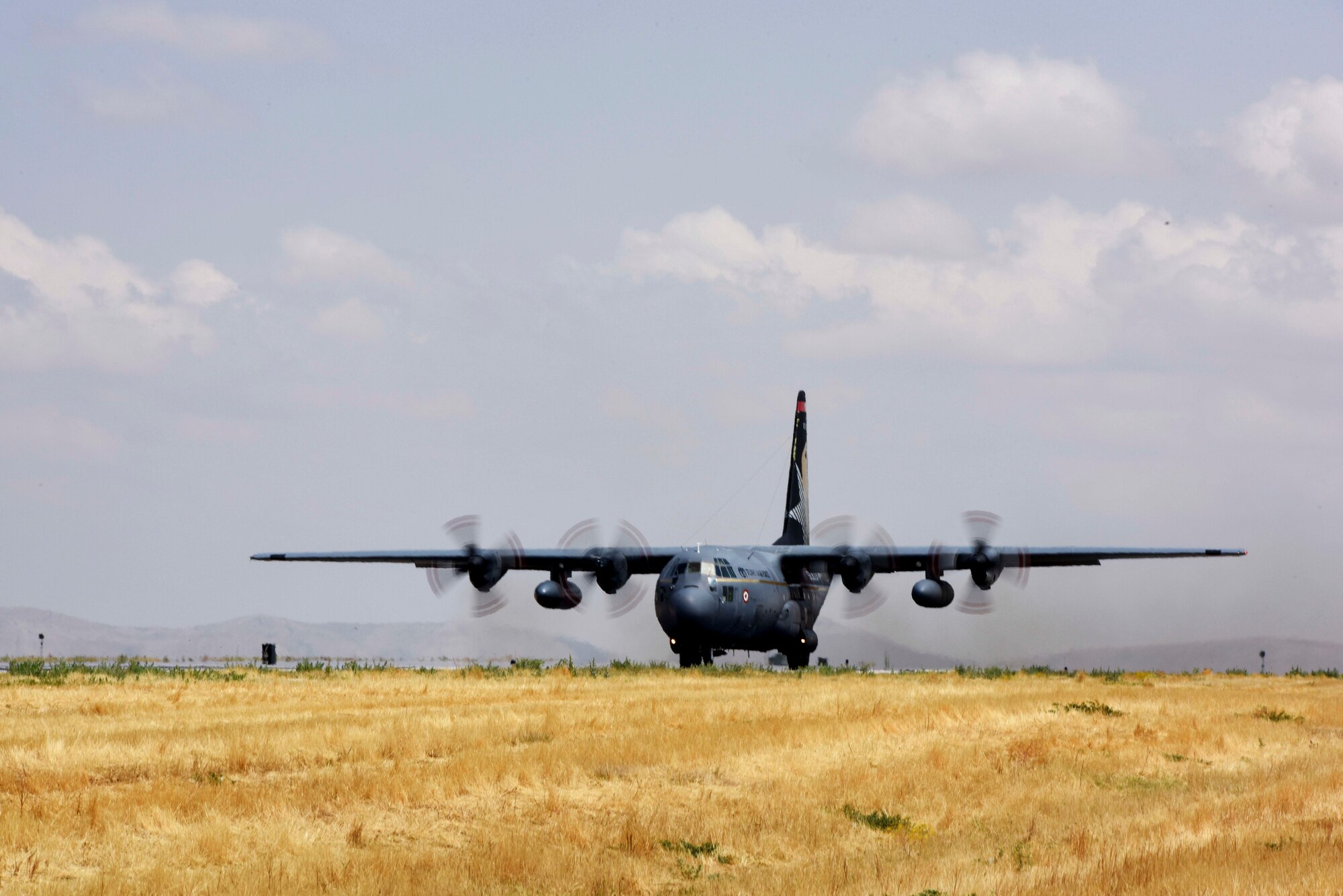A Turkish C-130 Hercules transport aircraft lands during Exercise Anatolian Eagle June 17, 2019, at the Third Main Jet Base, Konya, Turkey. The exercise involved a variety of aircraft from the U.S., Turkey, Qatar, Jordan, Pakistan, Italy, and NATO. Azerbaijan also joined the exercise as an observer nation. (U.S. Air Force photo by Senior Airman Joshua Magbanua)