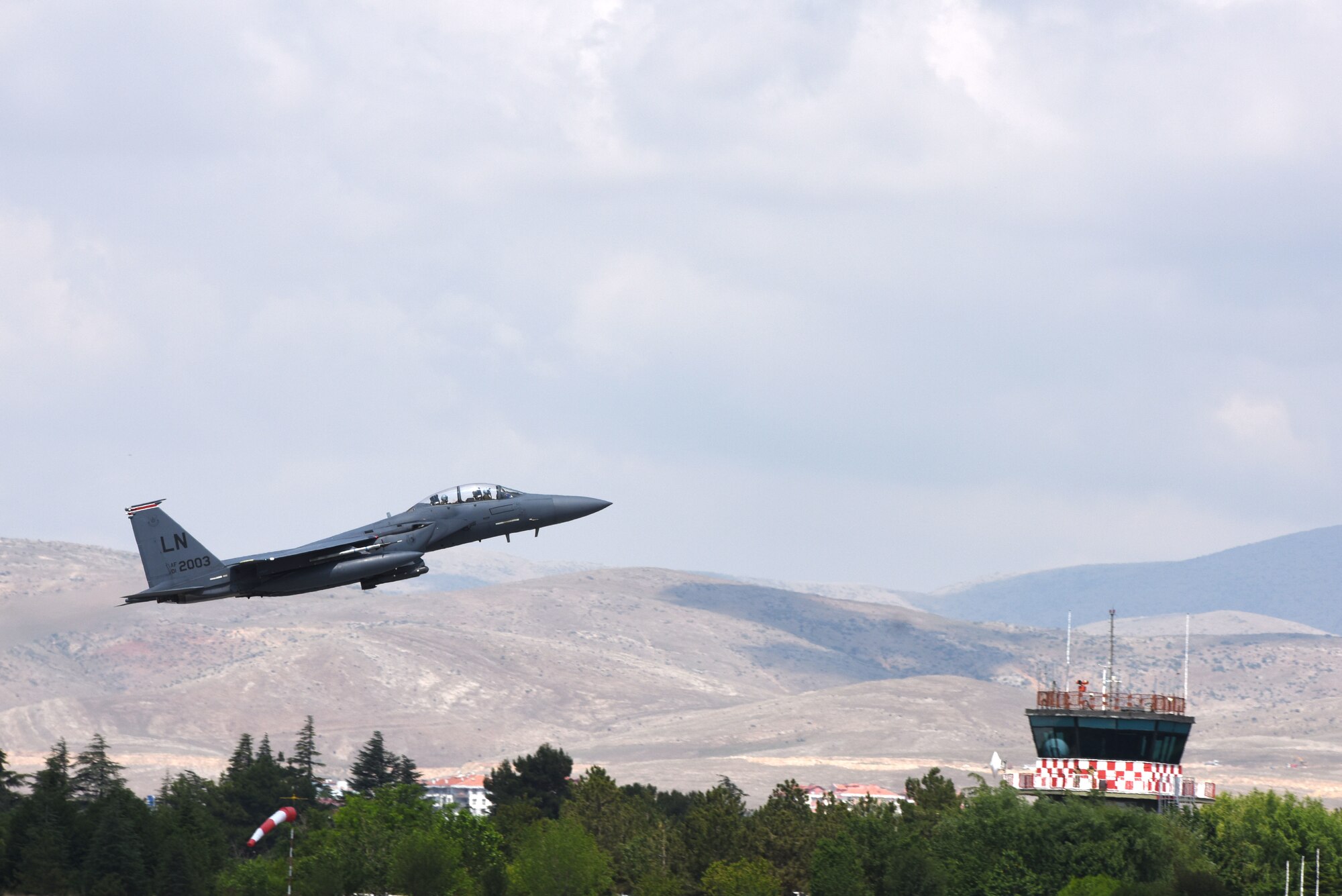 A U.S. F-15E Strike Eagle from the 494th Fighter Squadron takes off during Exercise Anatolian Eagle June 17, 2019, from Third Main Jet Base, Konya, Turkey. The approximately two-week long exercise involves multiple nations practicing a variety of aerial warfare tactics in a simulated conflict scenario.  (U.S. Air Force photo by Senior Airman Joshua Magbanua)