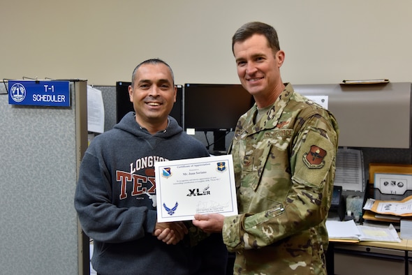 Juan Soriano, 47th Maintenance Directorate Plans and Scheduling work lead, was chosen by wing leadership to be the “XLer” of the week, for the week of June 10, 2019 at Laughlin Air Force Base, Texas. The “XLer” award, presented by Col. Todd Dyer, 47th Flying Training Wing vice commander, is given to those who consistently make outstanding contributions to their unit and the Laughlin Mission. (U.S. Air Force photo by Senior Airman John A. Crawford)