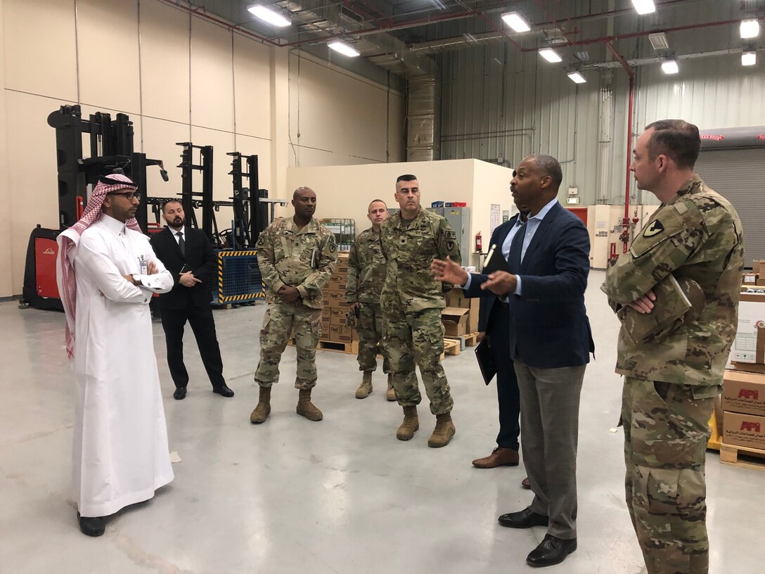 Peter Skillings, DLA Troop Support Medical’s Collective and Foreign Military Sales branch chief, speaks to representatives of the Saudi Arabia National Guard Health Affairs during a warehouse tour at Riyadh, Saudi Arabia May 2019.