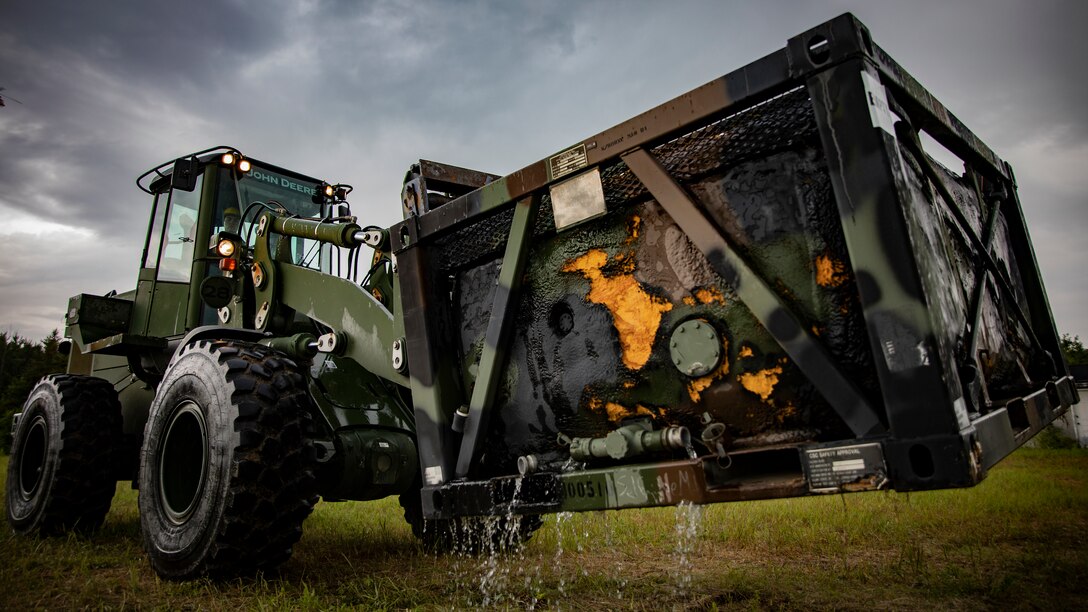 U.S. Marine Corps Cpl. Ryan Donnelly, a heavy equipment operator with Marine Wing Support Squadron 471, Marine Aircraft Group 41, 4th Marine Aircraft Wing, operates a tractor at Canadian Forces Base Cold Lake, Canada, June 19, 2019, in support of Sentinel Edge 19. Training exercises, such as SE19, ensure Reserve Marines are proficient and capable of successful integration with active-duty Marines, making MARFORRES critical to the Marine Corps’ Total Force. (U.S. Marine Corps photo by Lance Cpl. Jose Gonzalez)