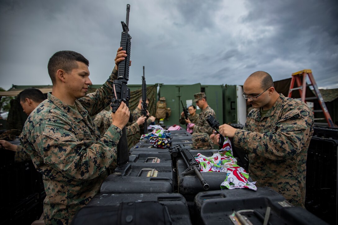 U.S. Marines with Marine Wing Support Squadron 471, Marine Aircraft Group 41, 4th Marine Aircraft Wing, clean their M16A4 service rifles at Canadian Forces Base Cold Lake, Canada, June 19, 2019, in support of Sentinel Edge 19. Training exercises, such as SE19, ensure Reserve Marines are proficient and capable of successful integration with active-duty Marines, making MARFORRES critical to the Marine Corps’ Total Force. (U.S. Marine Corps photo by Lance Cpl. Jose Gonzalez)