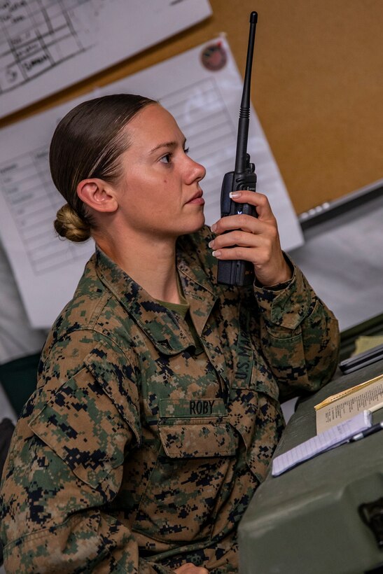 U.S. Marine Corps Lance Cpl. Charissa Roby, a radio watch officer with Marine Wing Support Squadron 471, Marine Aircraft Group 41, 4th Marine Aircraft Wing, makes a radio call at Canadian Forces Base Cold Lake, Canada, June 19, 2019, in support of Sentinel Edge 19. Training exercises, such as SE19, ensure Reserve Marines are proficient and capable of successful integration with active-duty Marines, making MARFORRES critical to the Marine Corps’ Total Force. (U.S. Marine Corps photo by Lance Cpl. Jose Gonzalez)