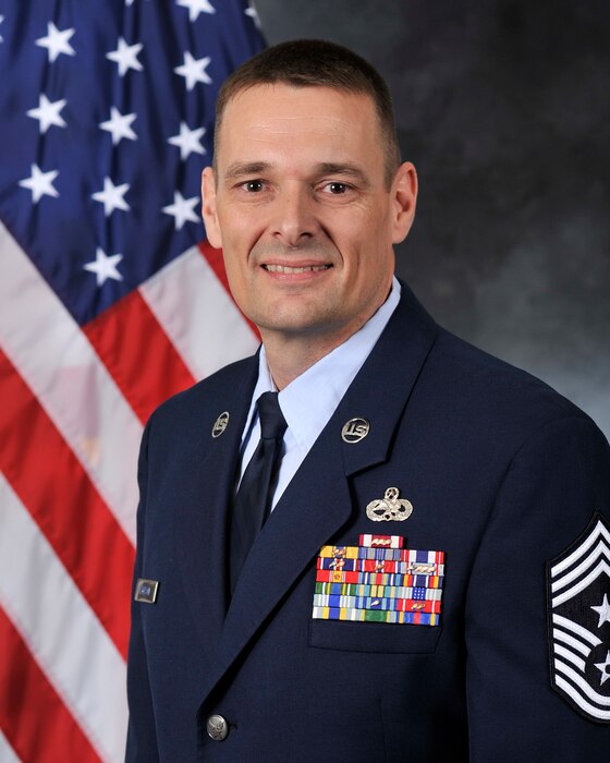 U.S. Air Force Chief Master Sgt. Greg Peterson, 633rd Air Base Wing command chief, effective June, 2019.