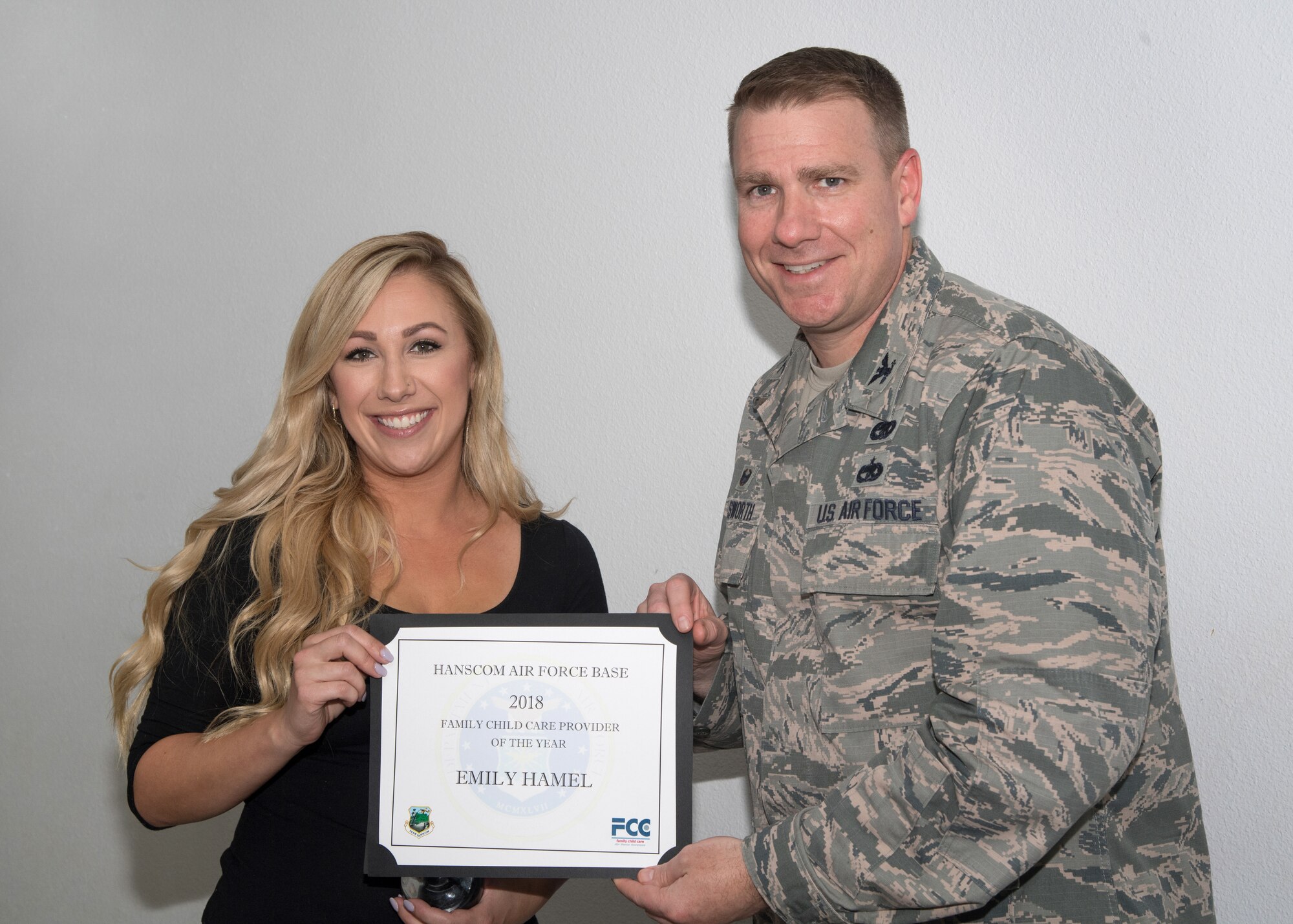 Senior leaders present award to FCC provider of the year